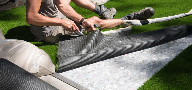 fijar césped artificial